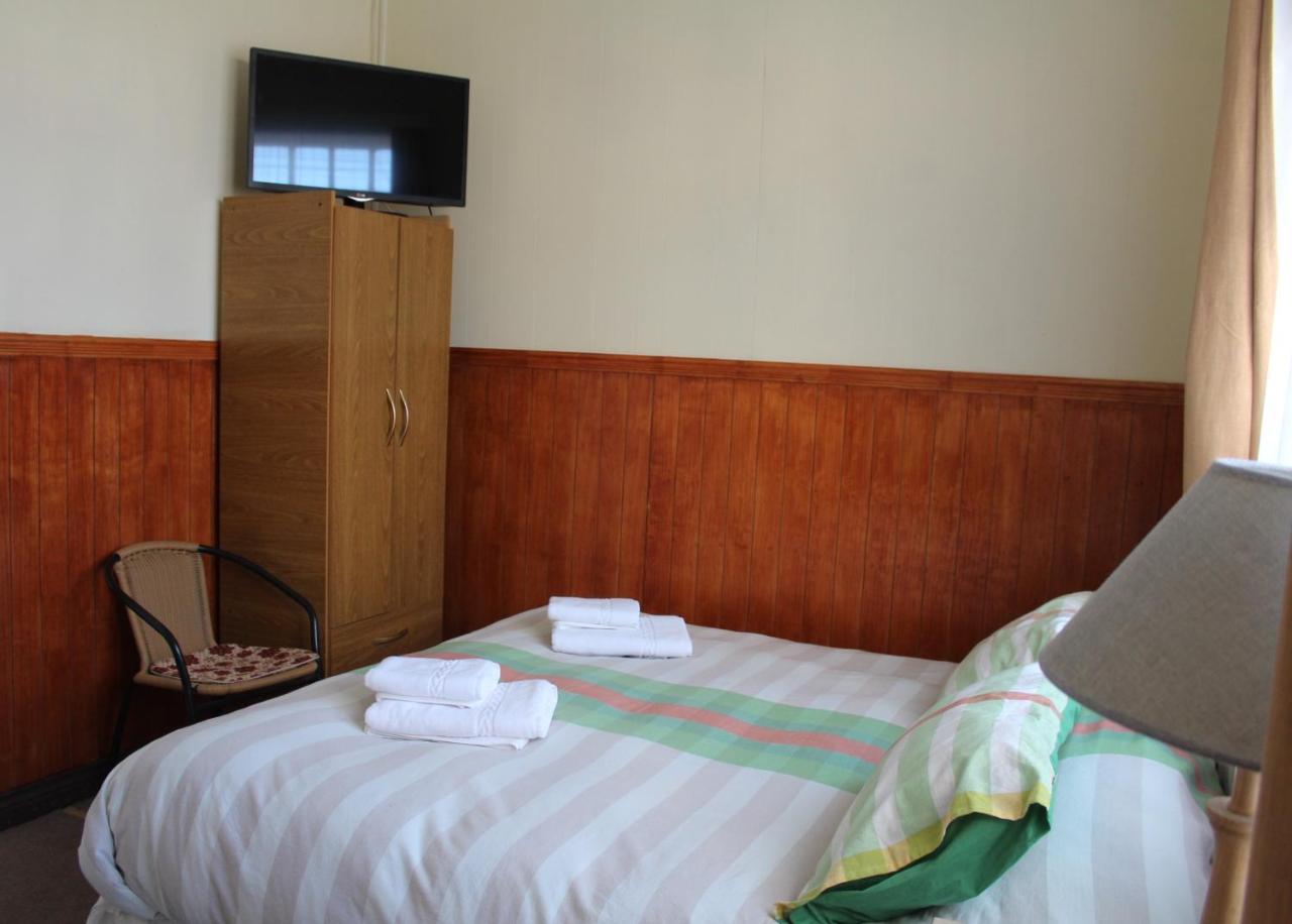 Hostal Y Cabanas Ainil Пунта-Аренас Экстерьер фото